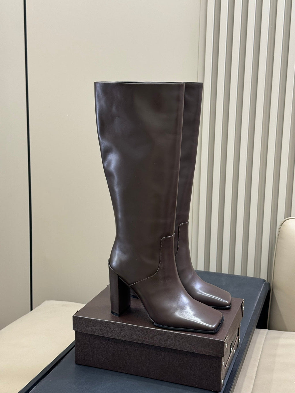 ALAIA 25S KNEE-HIGH SQUARE-TOE BOOTS IN BROWN CALFSKIN